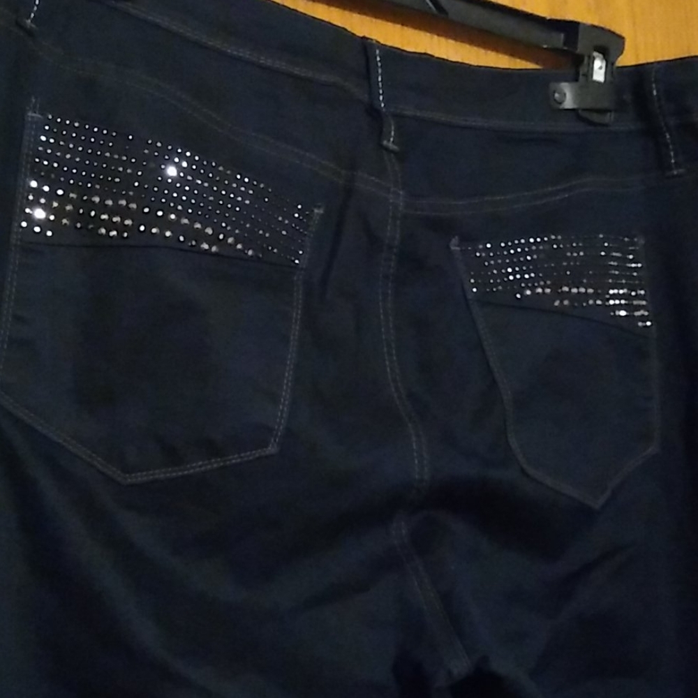 Royalty 18W Skinny leg dark wash jeans with lots of stretch.
